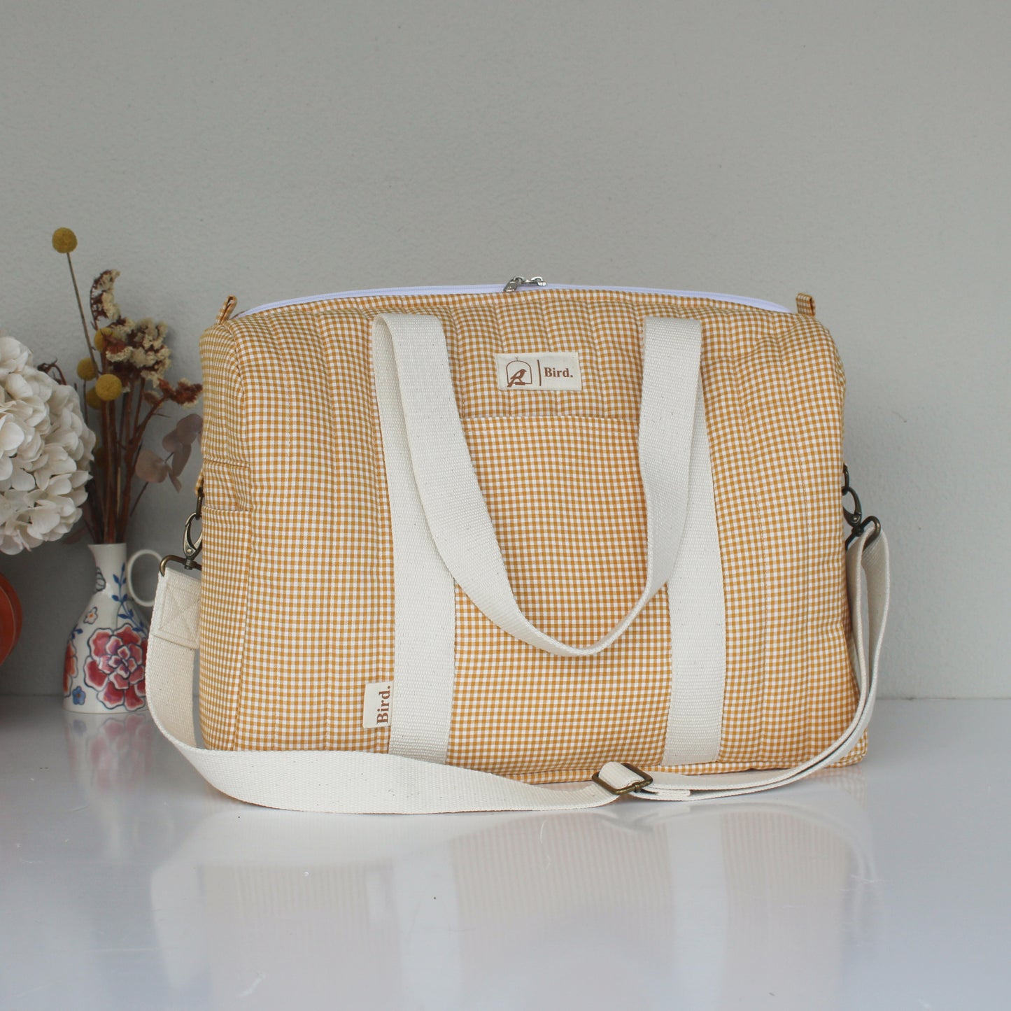 Honey quilted duffel bags