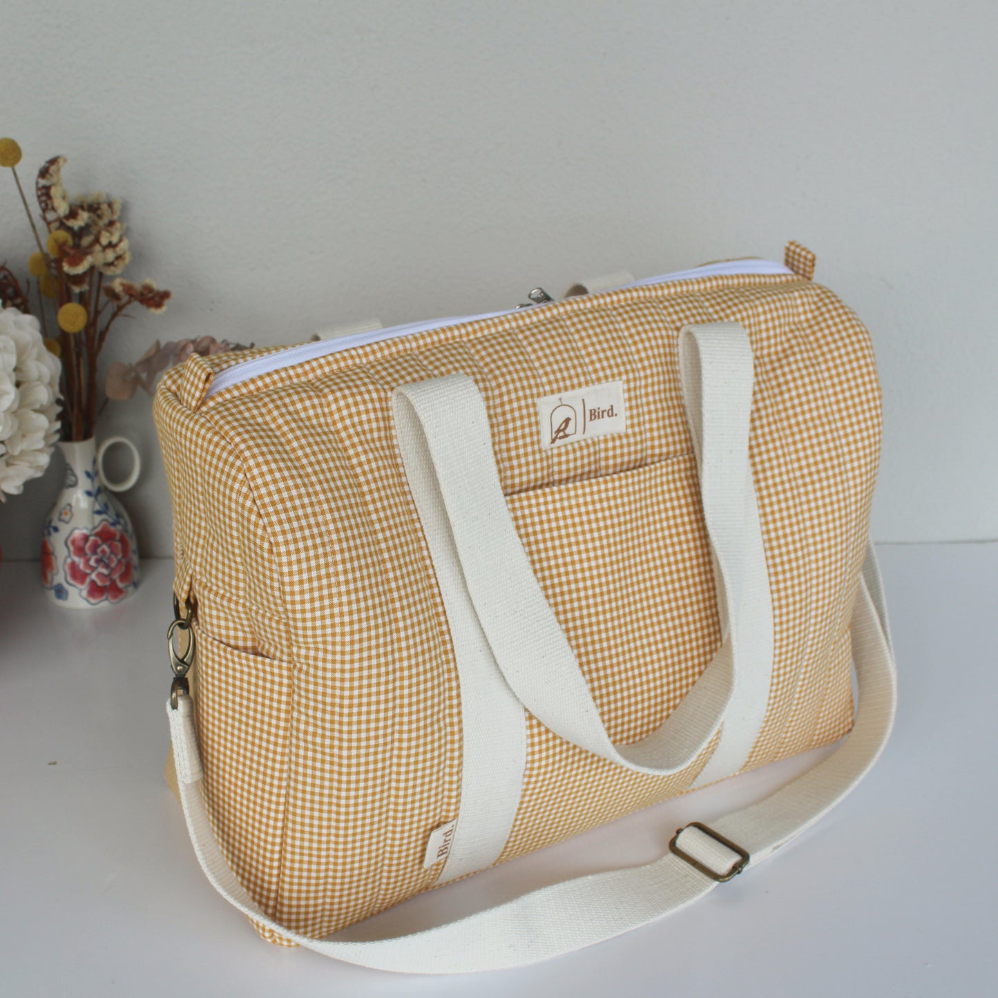 Honey quilted duffel bags